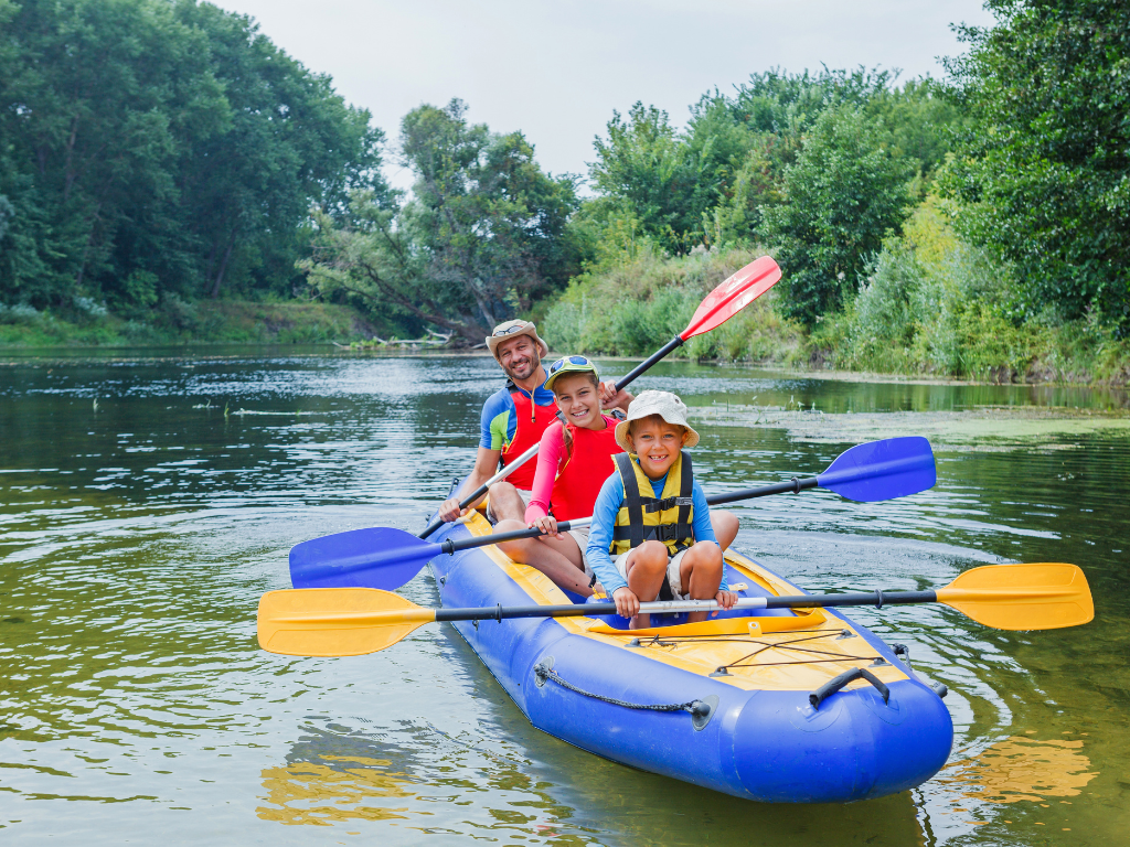 Father and sons kayaking